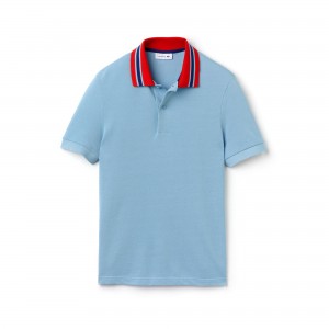 Polo Lacoste azul detalle cuello